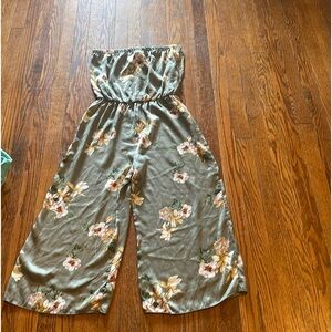 This is a floral green jumpsuit.